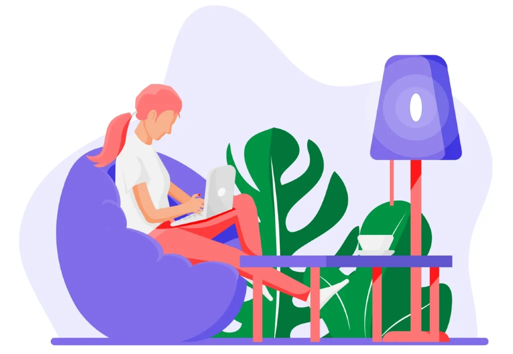 Kvinde sidder i lænestol og surfer på nettet